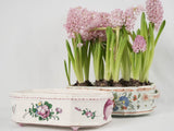 Timeless ceramic planter with delicate floral motifs