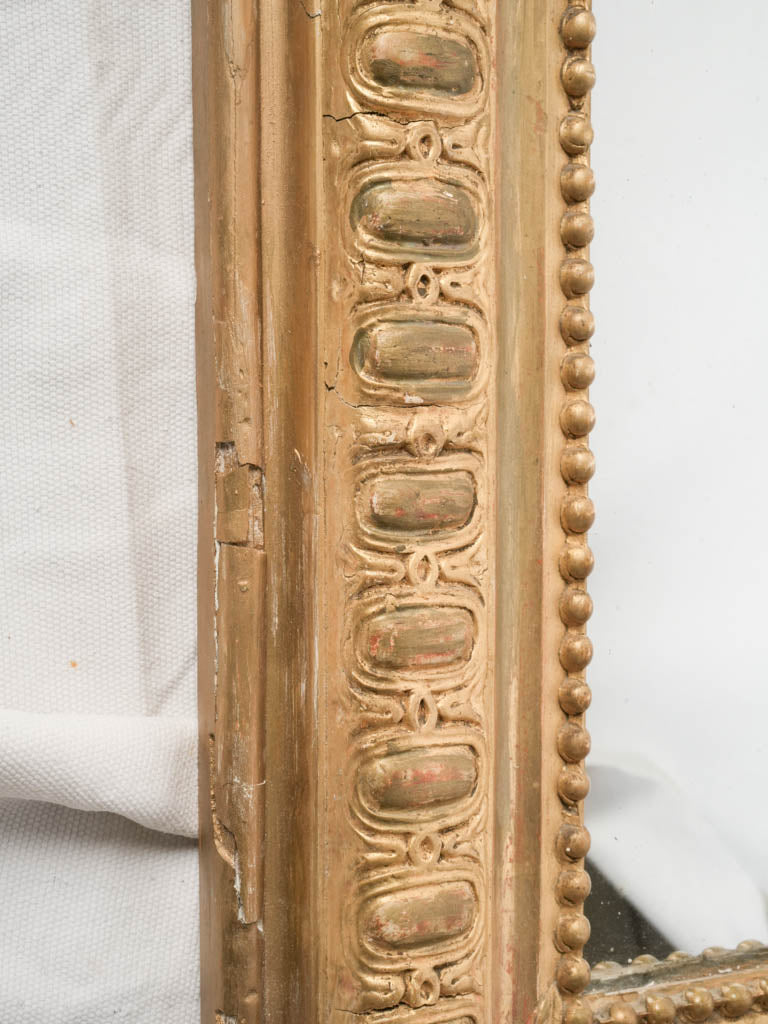Exuberant carved giltwood mirror  