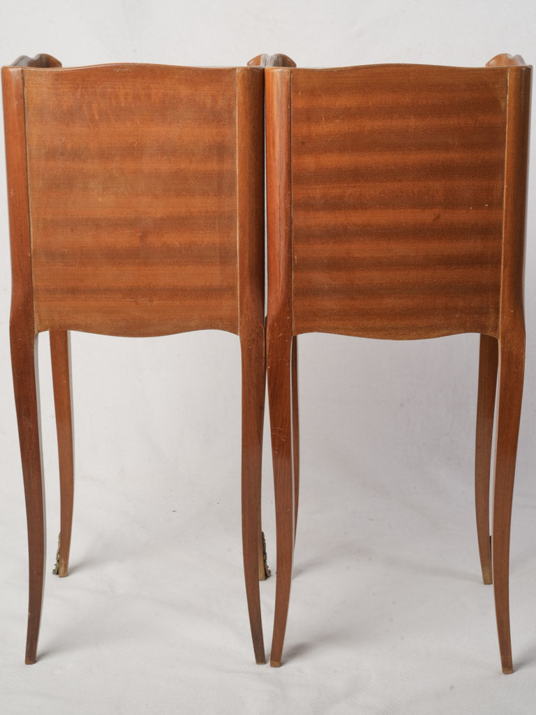 Honey-toned veneer nightstands pair  