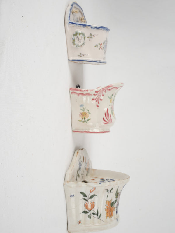 Antique French glazed earthenware wall vases