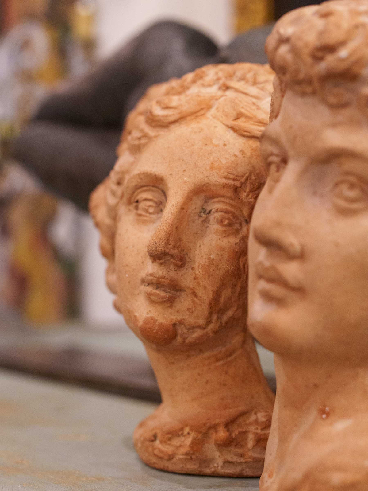 Pair of Small Classical Male and Female Heads in Terracotta - 8"