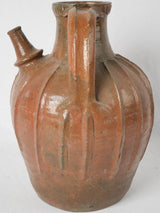Rustic French terracotta walnut oil pot