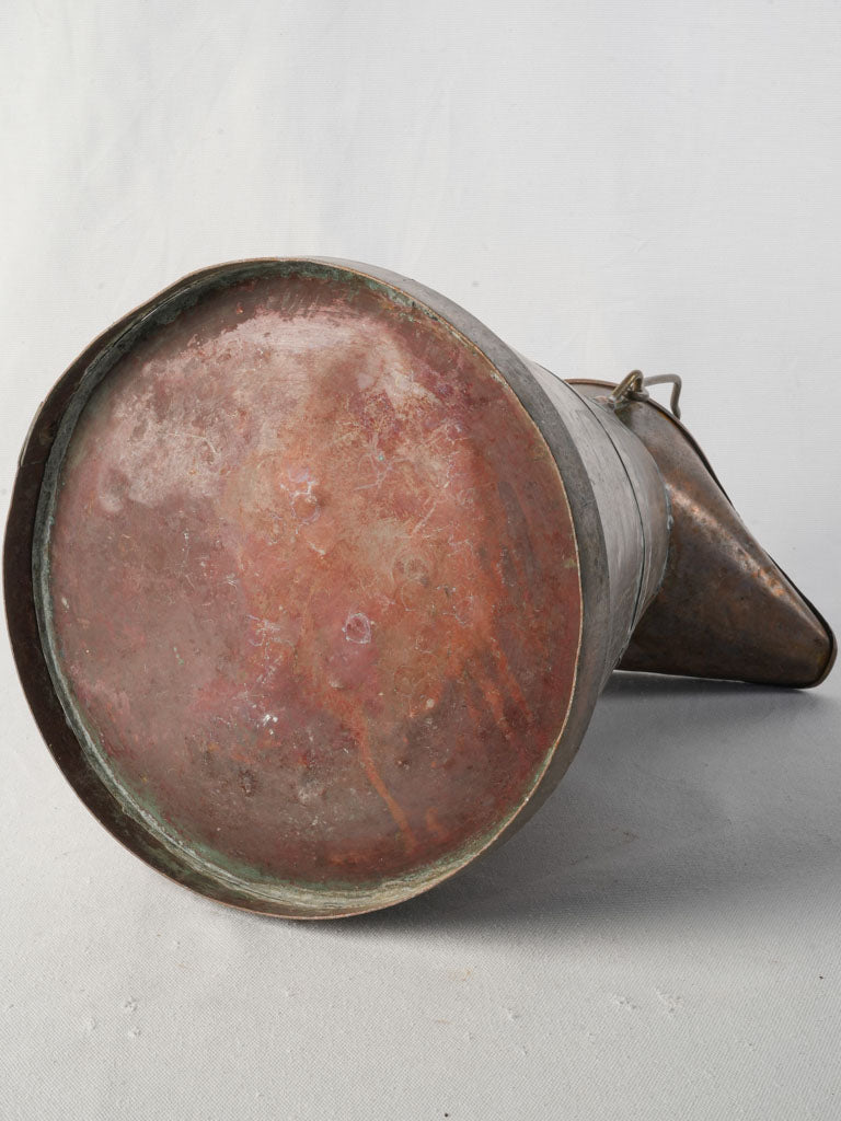 Ornate copper vineyard pouring pot  