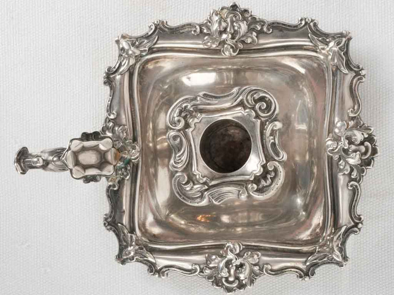 Time-worn silver luminary holder