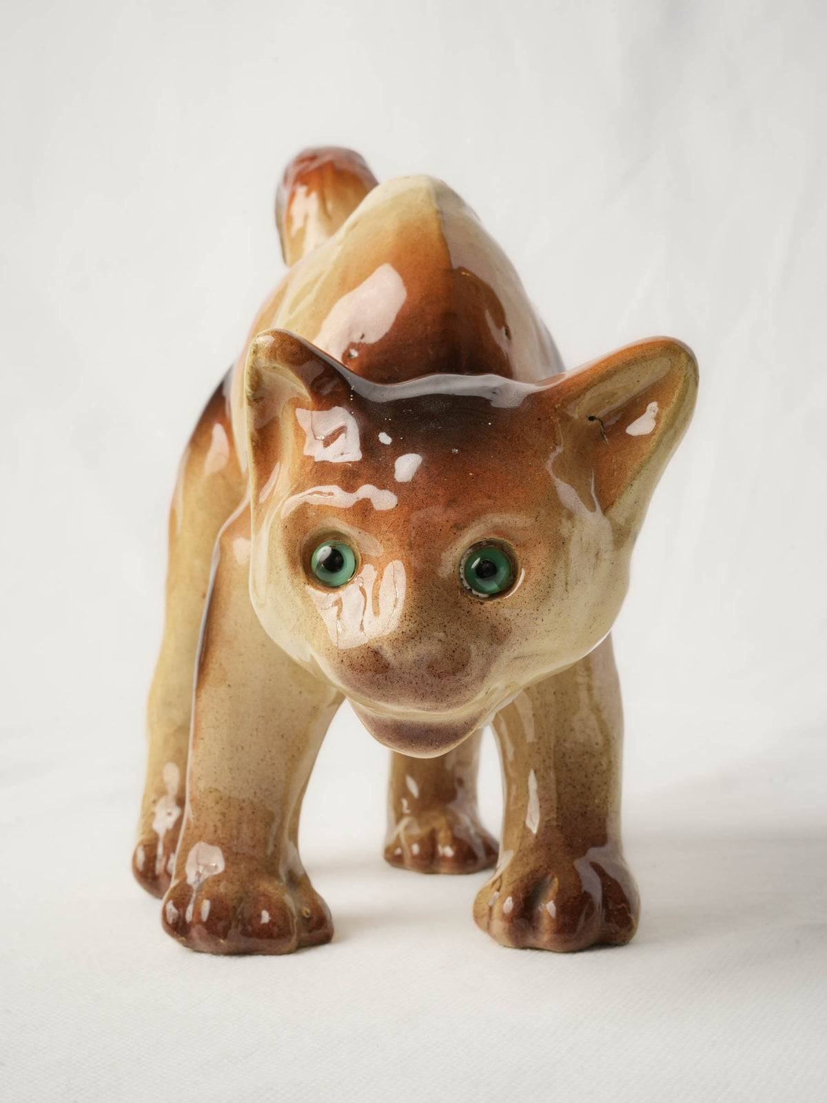 Playful Glazed Ceramic “Scaredy-Cat” Kitten, c. 1920 - 8" x 10¼"