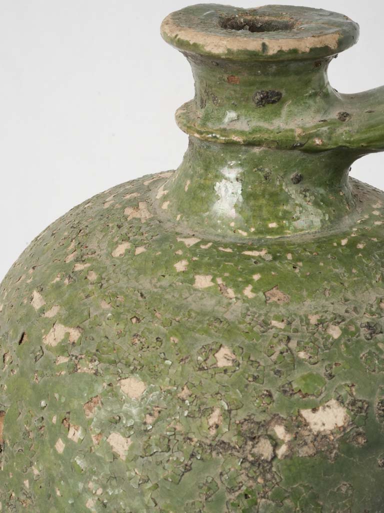 Handcrafted, traditional, glazed earthenware bottle