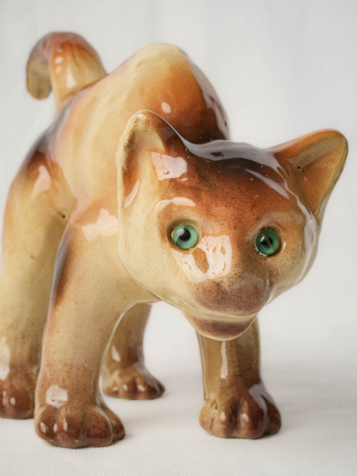 Playful Glazed Ceramic “Scaredy-Cat” Kitten, c. 1920 - 8" x 10¼"