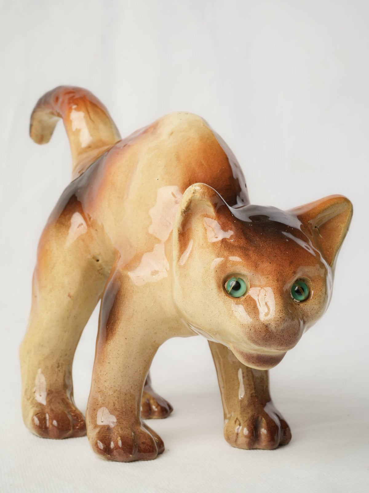 Playful Glazed Ceramic “Scaredy-Cat” Kitten, c. 1920 - 8" x 10¼"