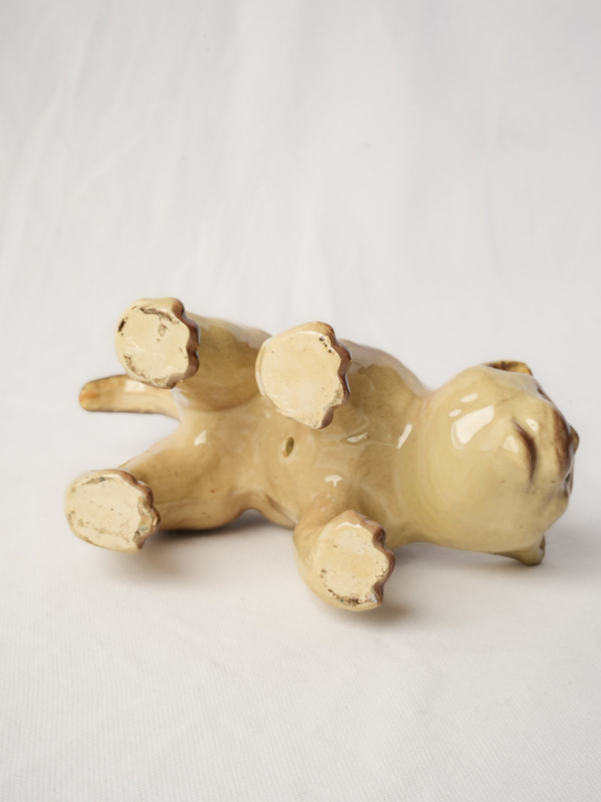 Playful Glazed Ceramic “Scaredy-Cat” Kitten, c. 1920 - 8" x 10¼"