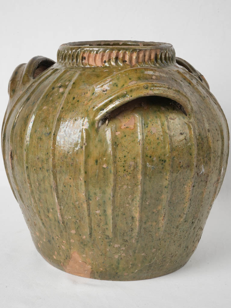 Antique French terracotta walnut oil jar