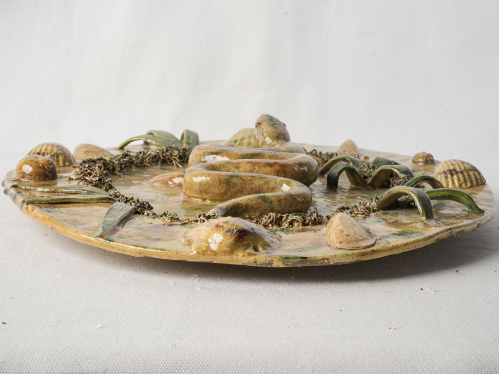 Classic aquatic-themed majolica plaque  