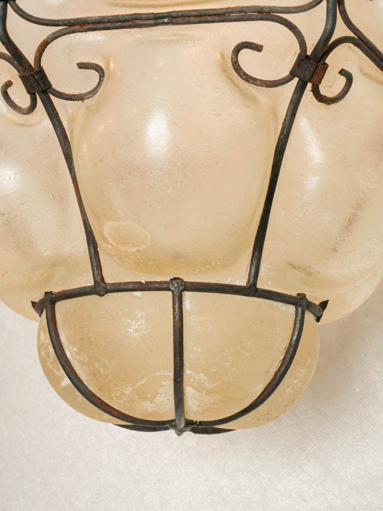 Handcrafted metal-caged lantern
