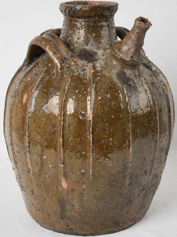 19th-century French walnut oil jar w/ dark green glaze 15¾"