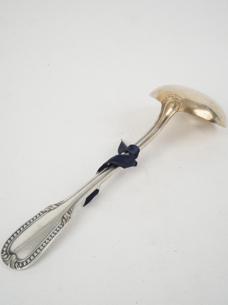 Ornate Pearl-Adorned Silver Soup Ladle