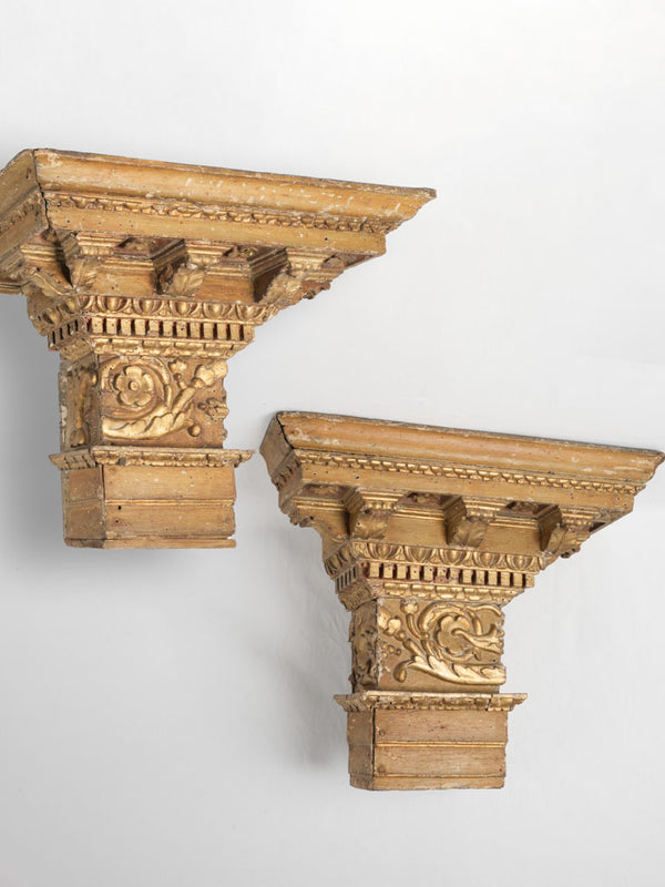 Pair of antique large gilded capitals from 18th-century columns, 24½"