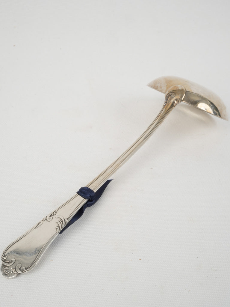 Regal Rococo style ladle