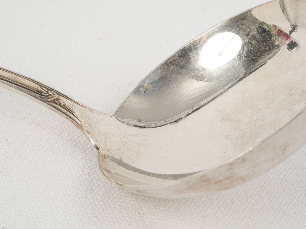 Detailed Rococo era soup ladle