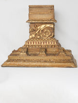 Time-worn Italian gilded wooden capitals