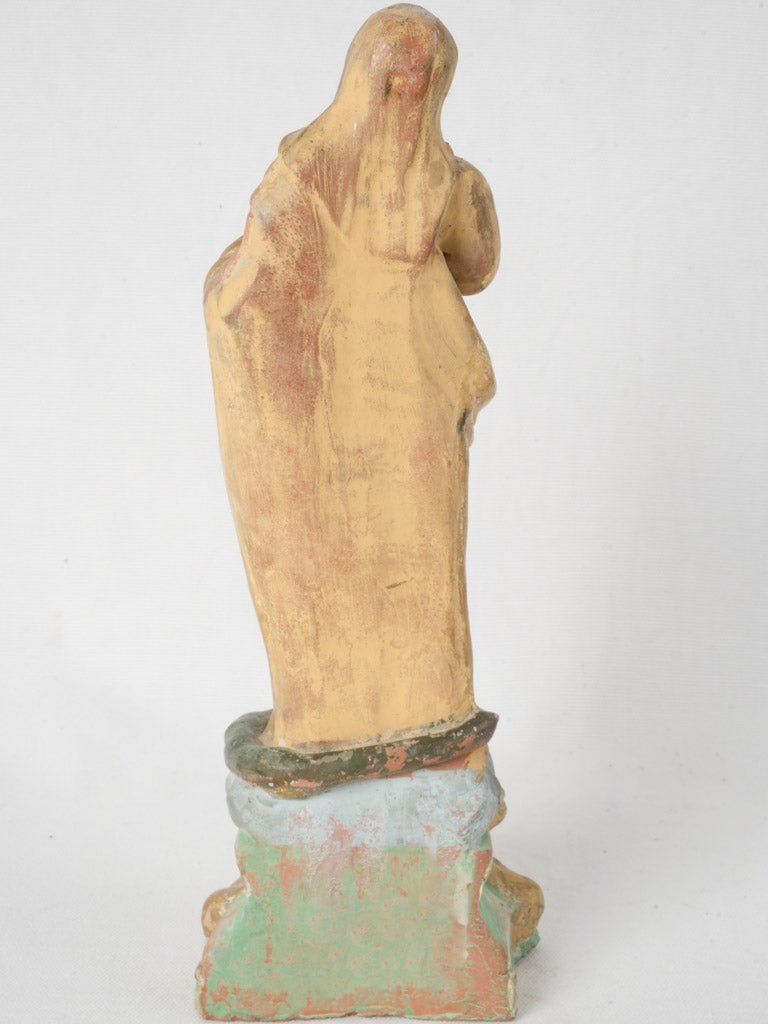 Italian-made antique apple-holding figurine