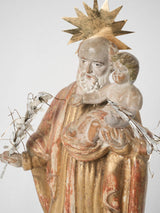 Time-worn religious terracotta statue