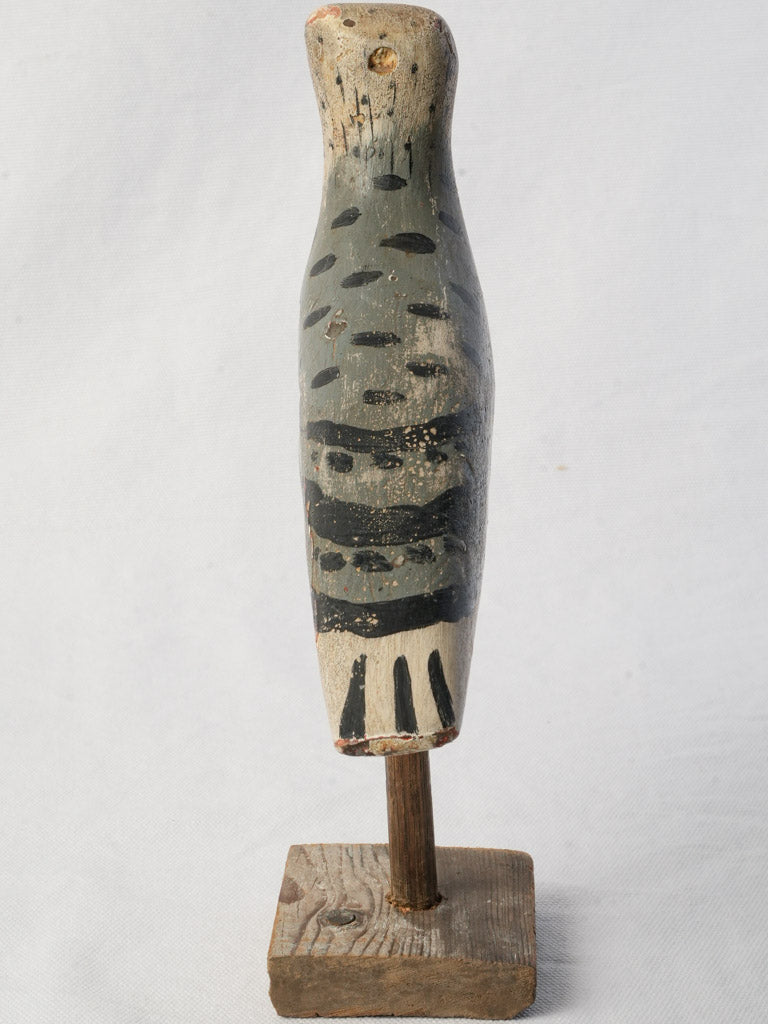 Timeworn paint folk art carving  