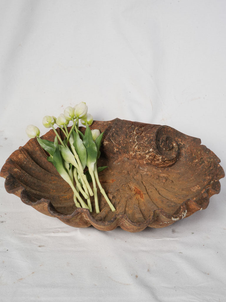 Weathered cast iron bird bath  