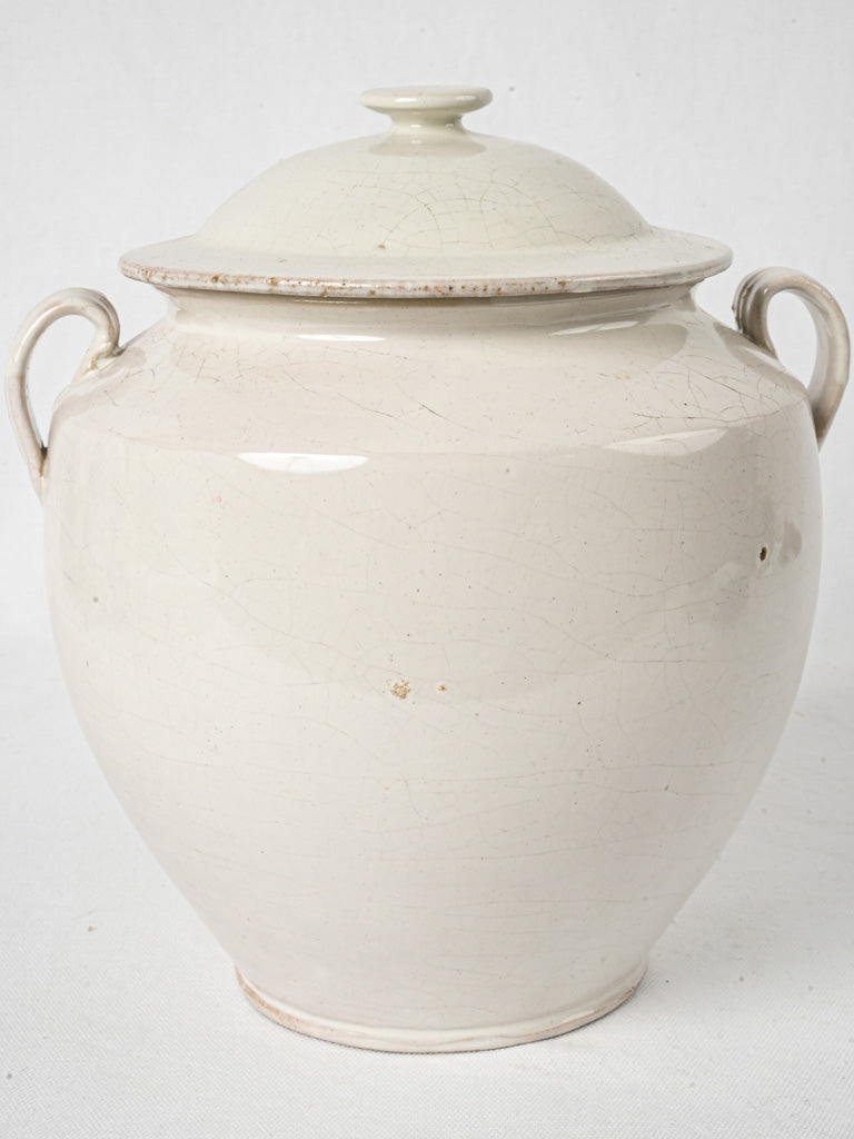 Ornate white glazed confit urn