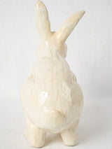 Aged terracotta rabbit sculpture decor