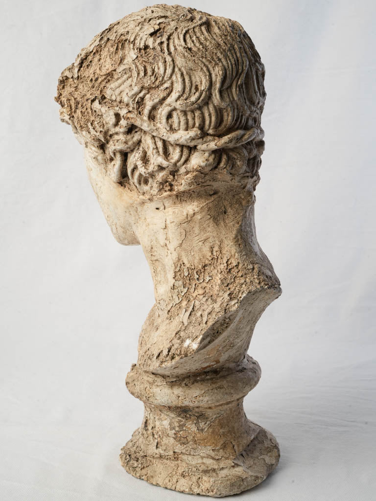 Serene expression garden sculpture.