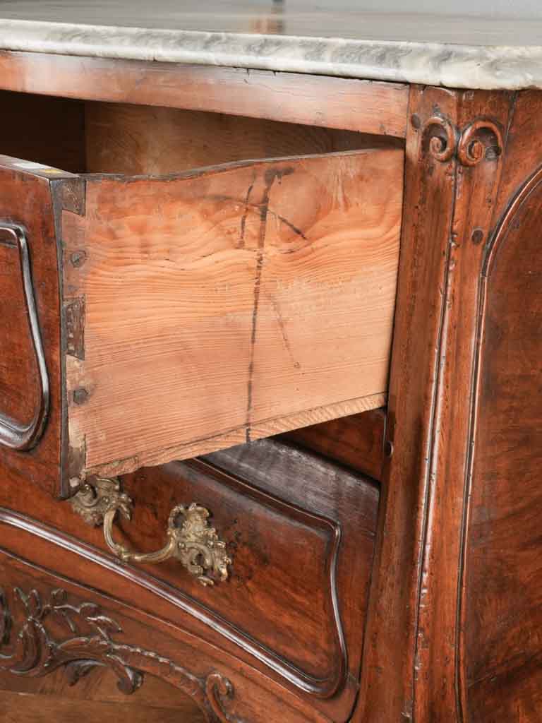 Time-worn Regence marble commode