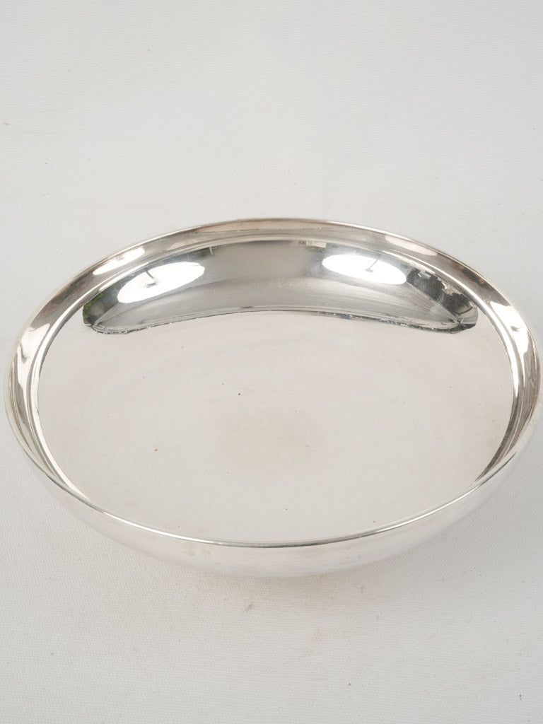 Artifact-like ornate silver fruit coupe