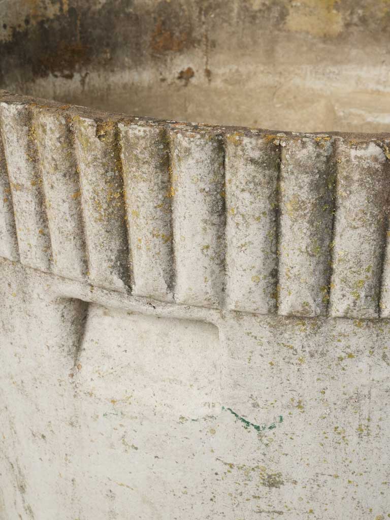 Distinctive cannelure-inspired cement vessels