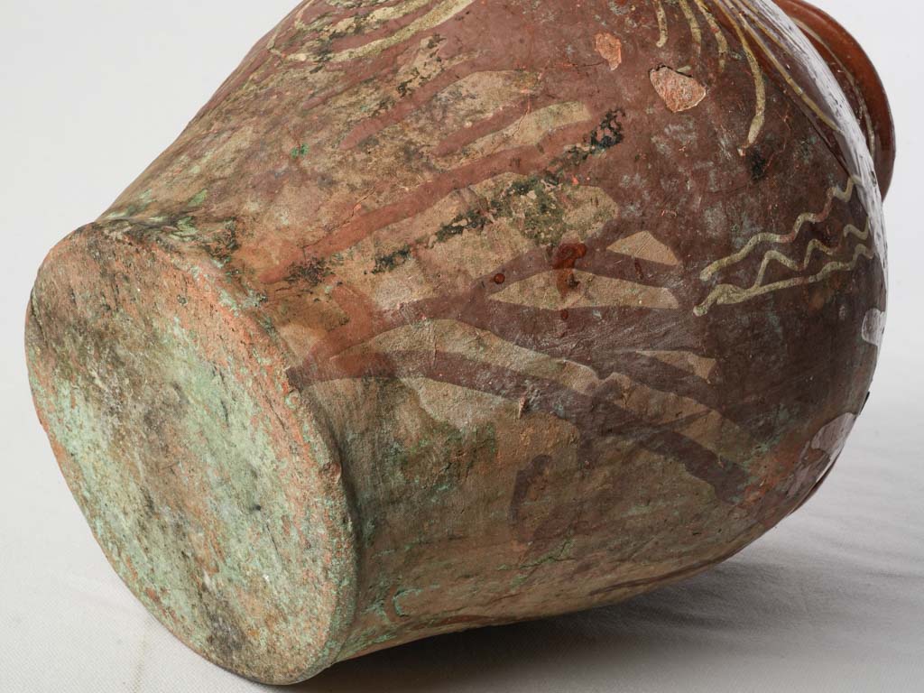 Old-world French earthenware jar.