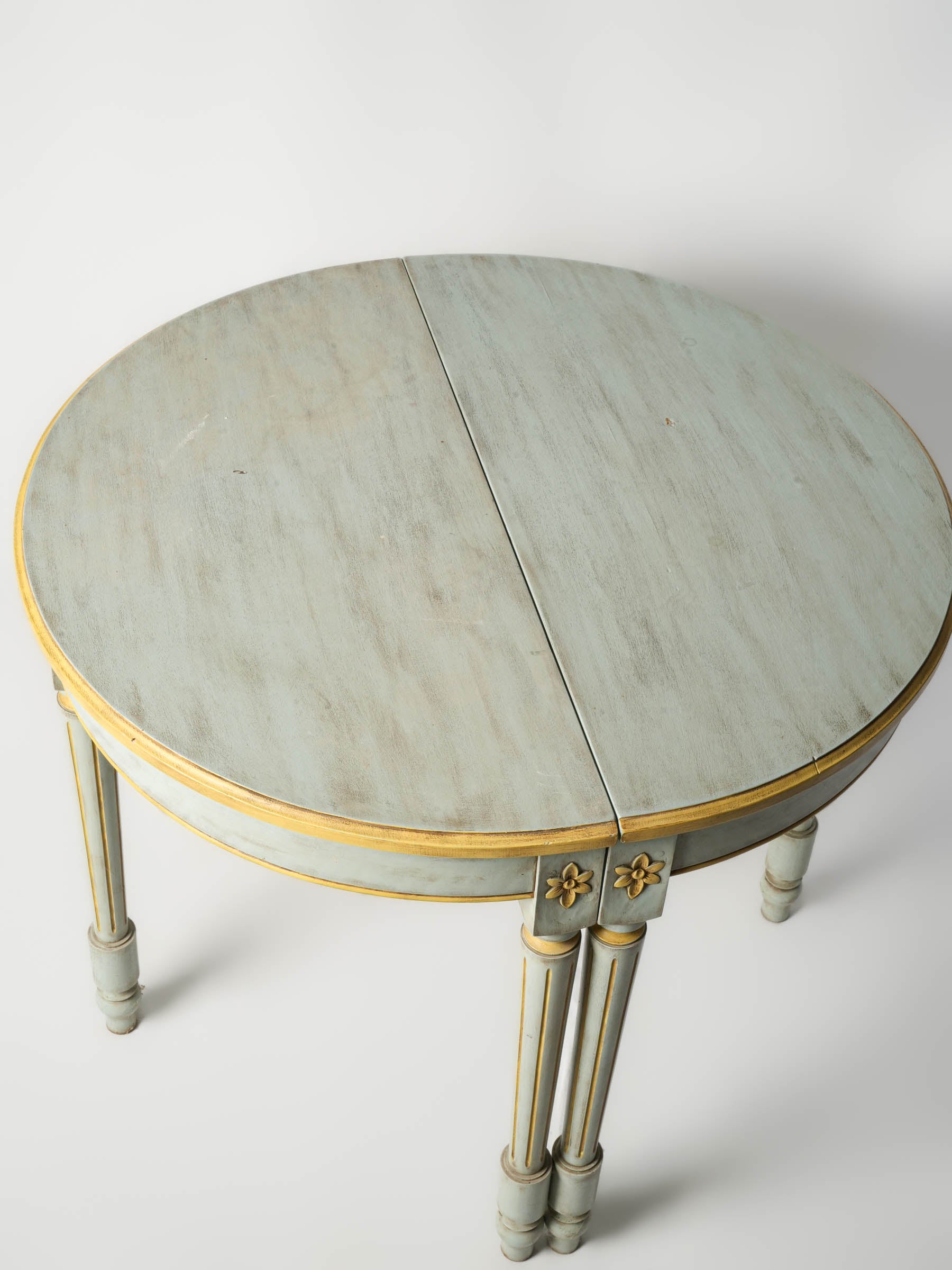 Decorative fluted legged display tables