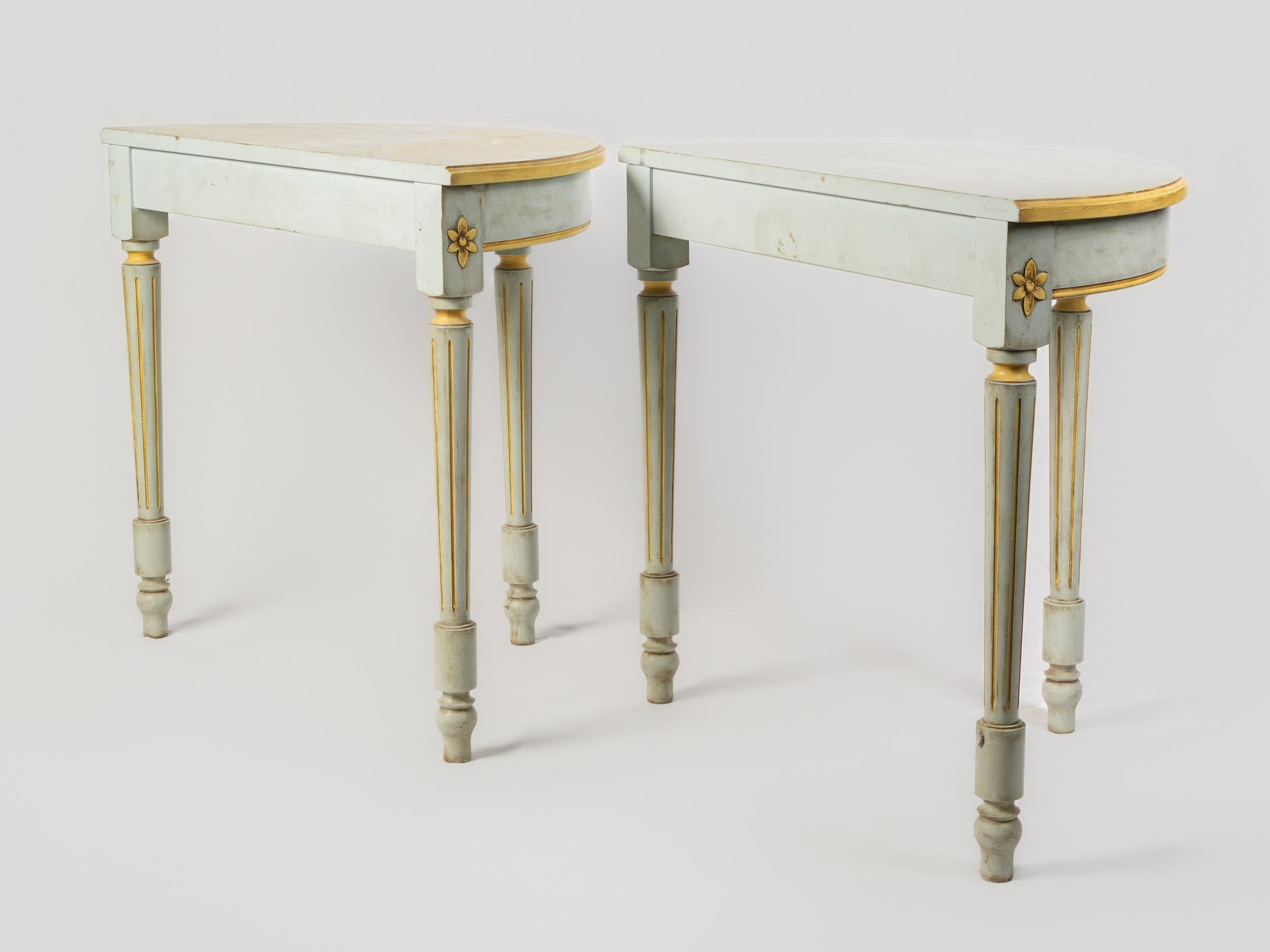 Artistic aged finish display tables