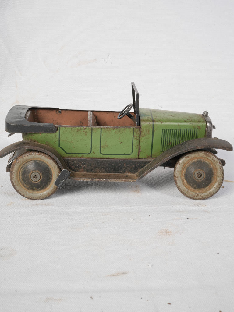 Artisanal crafted metal mini car  