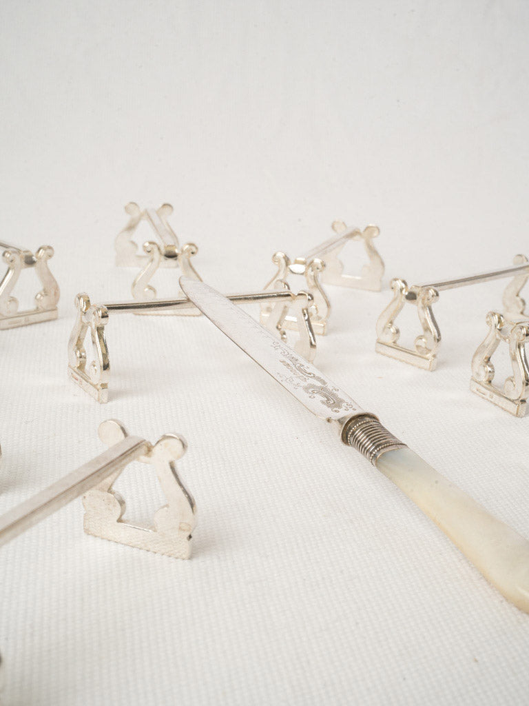 Antique silver-plated knife rests  