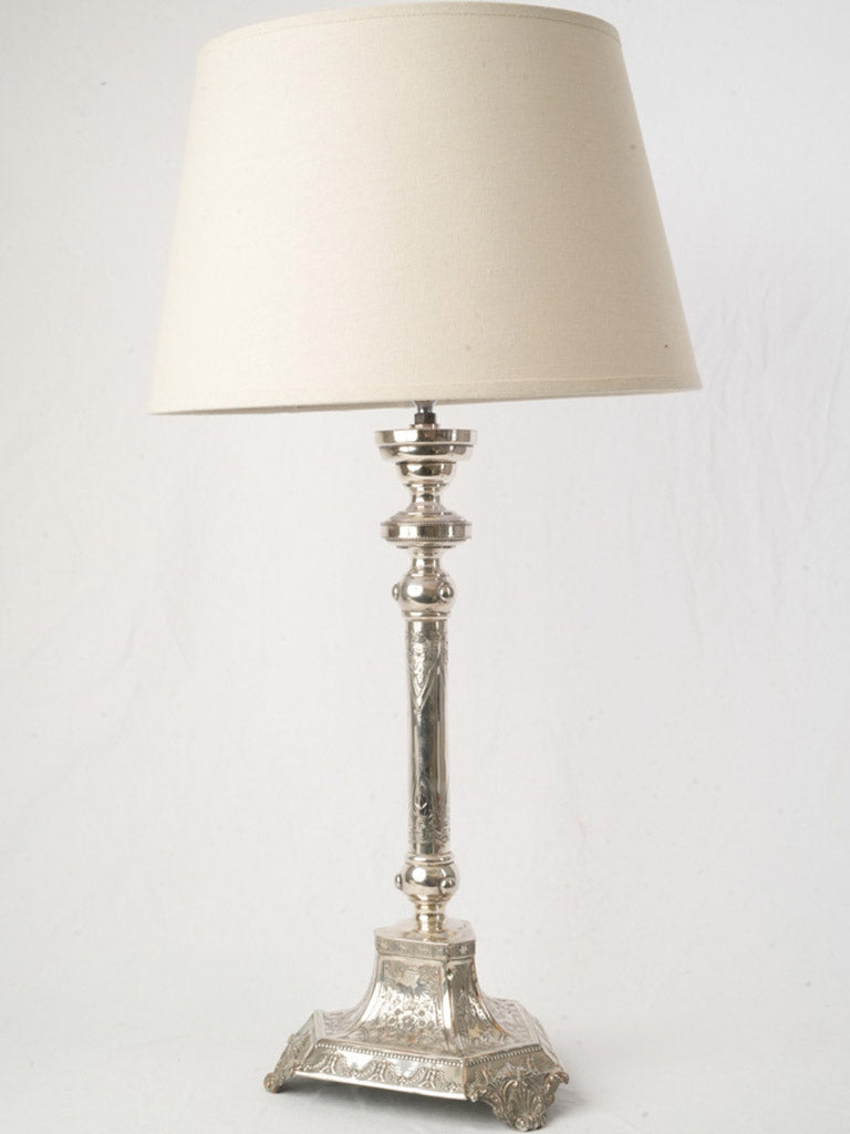 Ornate tripod base lamp     