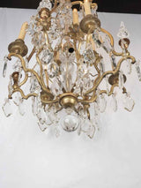 Historical two-tiered chandelier crystal glow