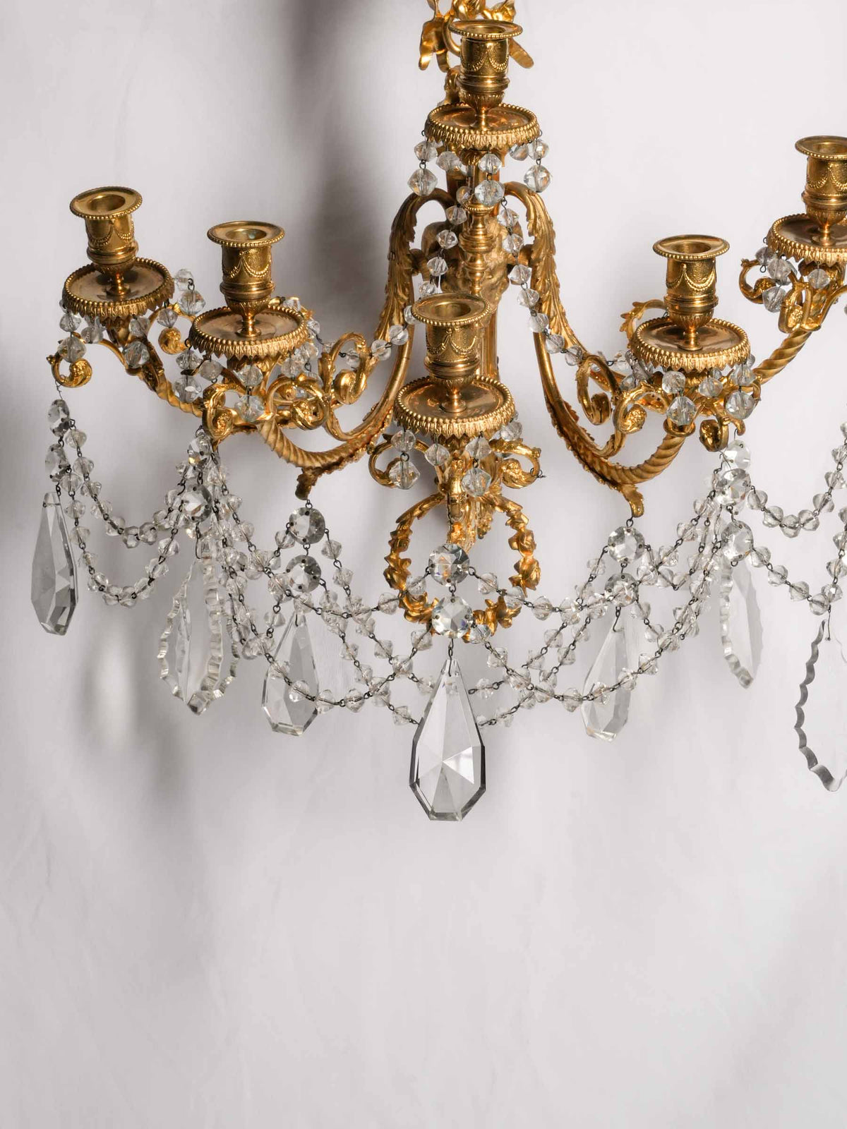Exceptional Pair of French Gilt-Bronze and Crystal Wall Sconces with Ram’s-Head Decoration, Late 19th-Century- 19" x 21¼"