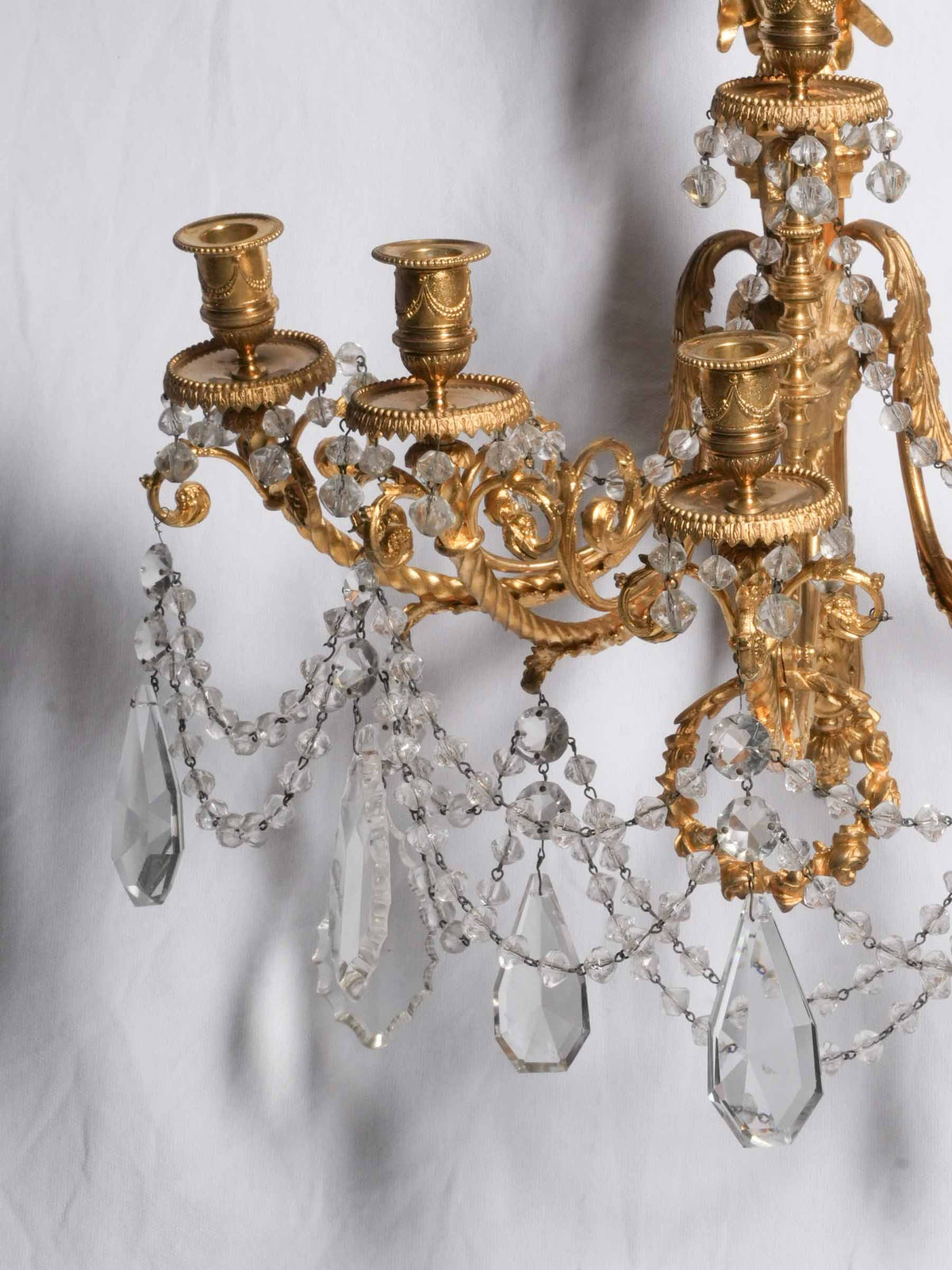 Exceptional Pair of French Gilt-Bronze and Crystal Wall Sconces with Ram’s-Head Decoration, Late 19th-Century- 19" x 21¼"