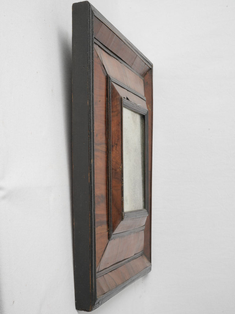 Lovely foxing walnut French Huguenot mirror