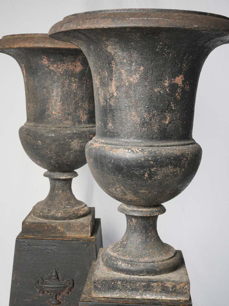 Striking Pair of Early 19th Century Cast Iron Médicis Urns on Bases w/ Black Finish - 39½"