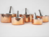 Collection of vintage French copper saucepans