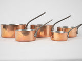 Collection of vintage French copper saucepans