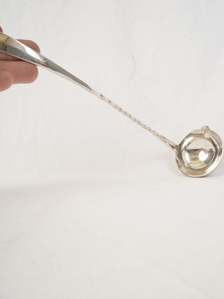 Mellowed sheen silver ladle
