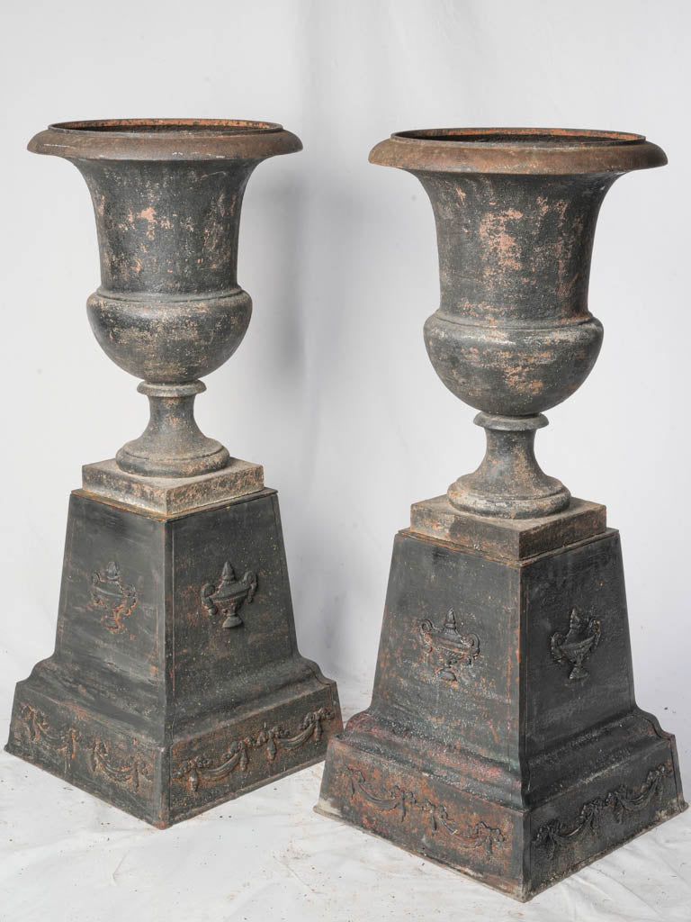 Striking Pair of Early 19th Century Cast Iron Médicis Urns on Bases w/ Black Finish - 39½"