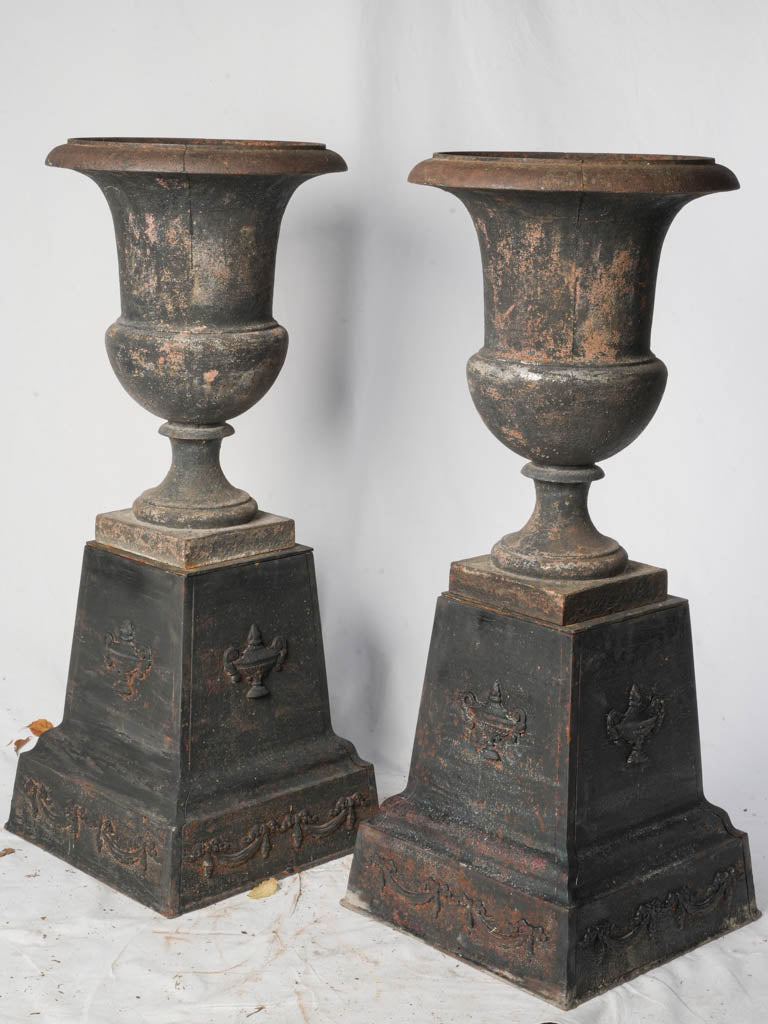 Striking Pair of Early 19th Century Cast Iron Médicis Urns on Bases w/ Black Finish - 39½"