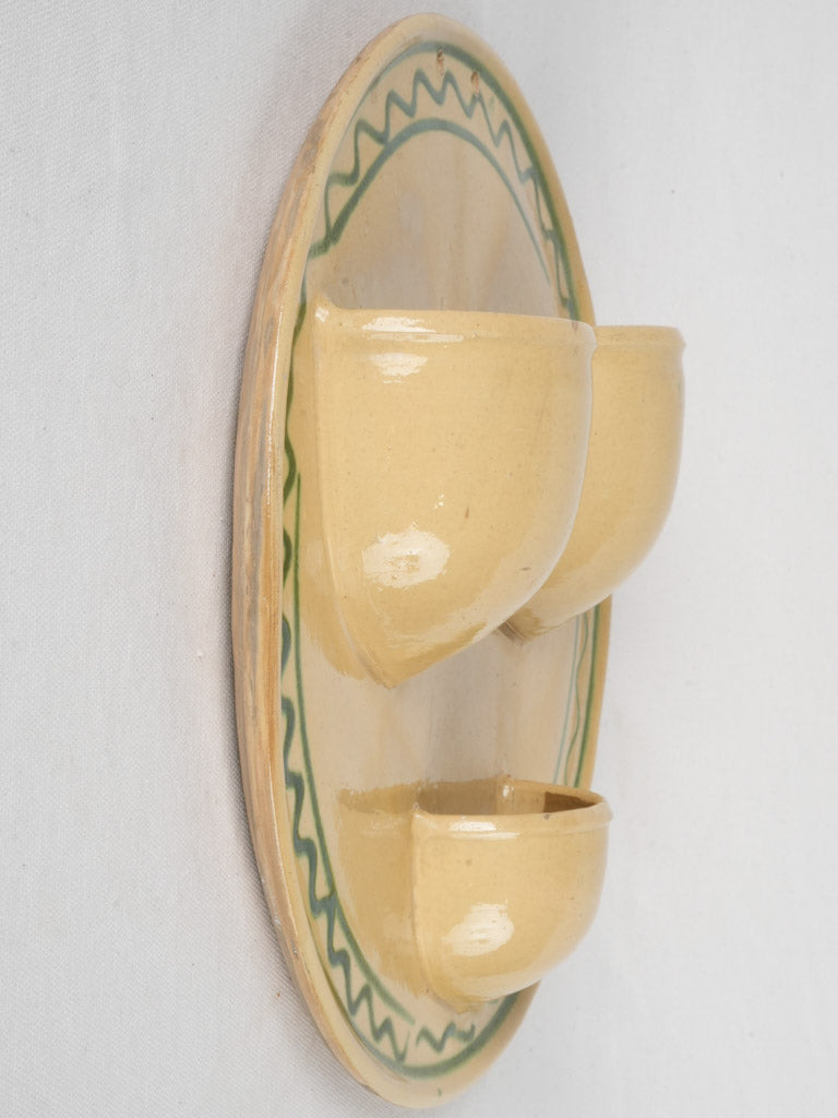 Antique yellow-green cutlery wall strainer  