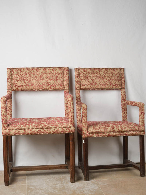 Two antique French armchairs w/ red fabric